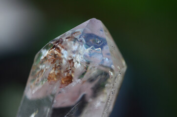 High Quality Clear Quartz with Hematite inclusions. Healing stone with Unique formations, Quartz Scepter with Hematite. Witches Crystal healing crystals, macro photo bright natural lighting. 