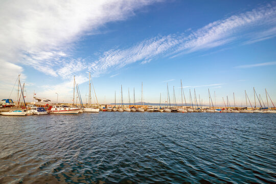 Bursa, Turkey - December 07, 2019: Photographs taken from different angles of the port in trilye town of bursa province. boats anchored on shore on a sunny winter day.