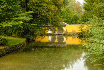 Small lake in grounds of the 400 year old water games castle of Schloss Hellbrunn located in a Southern district of Salzburg, Austria.
