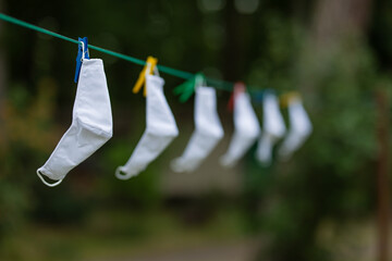 Mouthguard masks are on the clothesline for drying after washing  protection from Corona