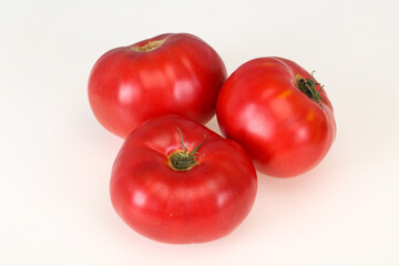 Red ripe tomato isolated on white