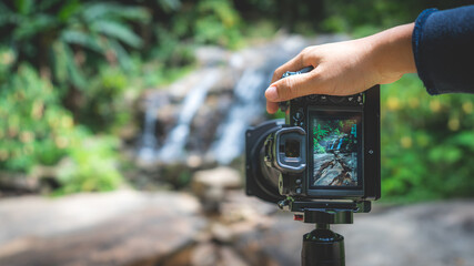 Photographer With Digital Camera
