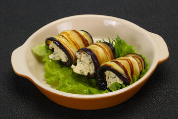 Stuffed eggplant roll with cheese and herbs