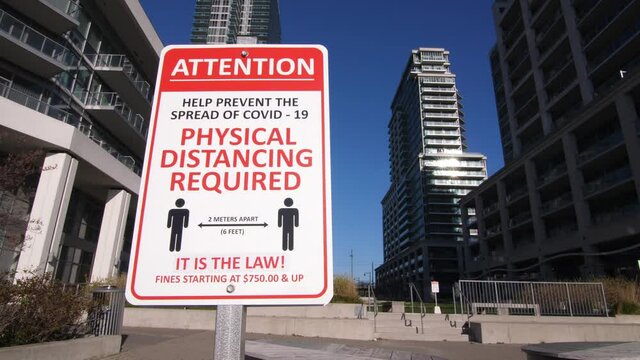 Covid-19 Physical Distancing Sign Near Condos In Mimico, Toronto, Canada.