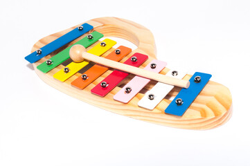 Toy xylophone on white background