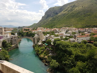 Fototapeta na wymiar Old bridge stari most over the Neretva river, Mostar, Bosnia and Herzegovina