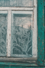 frosty pattern on an old window