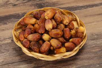 Sweet tasty dry dates in the basket
