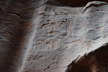 Ancient rock carvings in the sandstone of the Wadi Rum Desert, Jordan