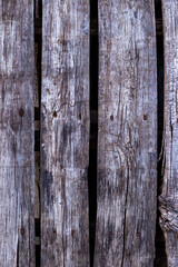 Background from old wooden boards. Old, gray boards fastened with rusty nails.