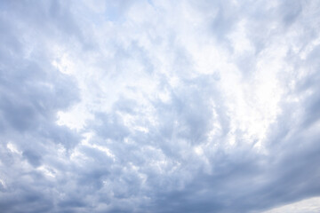 The background texture and dramatic sky with low clouds