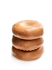 Stack of bagels isolated on white background