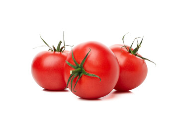 Fresh ripe tomatoes isolated on white background