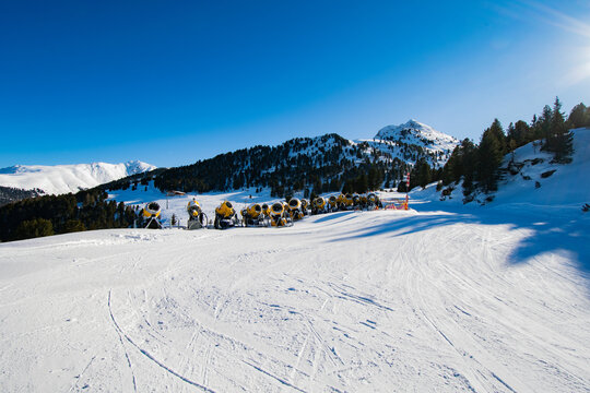 Snow cannon on ski slope in Hochoetz
