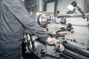 the old Metalworking machine, made in the middle of the last century, is still in good condition. The use of old technology in a time of crisis and stagnation