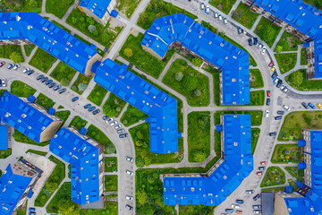 Aerial view of the housing estate with blue roofs. Estate Sloviki located on Witosa street is also called 