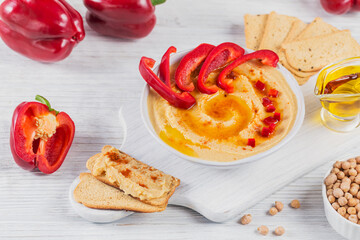 Healthy breakfast with homemade hummus on white wooden background. Diet and Healthy snack food