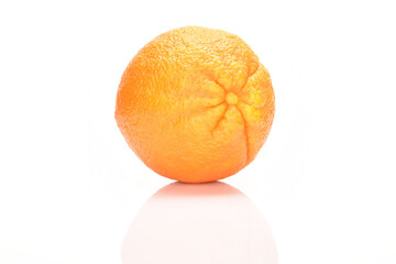 Ripe, organic orange, macro, on a white background.