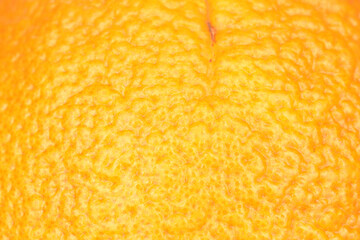 Ripe, organic orange, macro, on a white background.