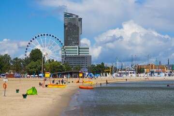 Gdynia - sandy beach and the skyscraper
