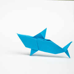 origami shark on a white background