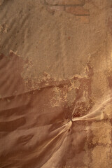 Mediterranean style red and yellow antique wall texture with sunlight