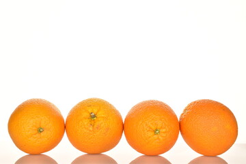 Ripe, organic orange, macro, on a white background.