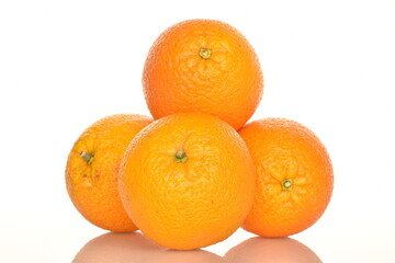 Ripe, organic orange, macro, on a white background.