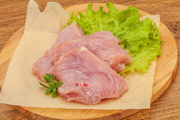 Raw turkey breast steak for cooking
