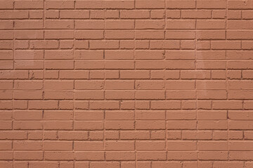 Brown painted brick wall in runnning bond and jack bond patterns, bbackground with creative copy space, horizontal aspect