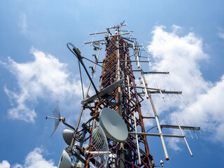 Group of antennas, satellite dishes for telecommunications, television broadcast, cellphone on...