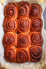 Obraz na płótnie Canvas cinnamon bun roll home baked sweet dessert goods Menu concept healthy food background top view copy space
