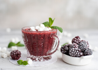 smoothie made from frozen blackberries, mint and chia seeds