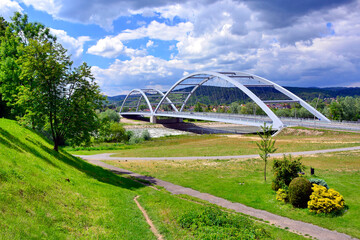 View of  steel bridge cross over Dunajec river in Nowy Sacz, Poland