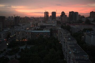 Kyiv city skyline at sunset. Beautiful night cityscape with traffic lights  - 355001236
