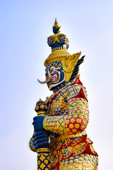 Fototapeta na wymiar Giant guardian statue in Bangkok Thailand on blue sky background
