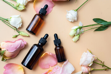 Obraz na płótnie Canvas Creating homemade cosmetics with natural extracts. Serum with roses petals. Skin care concept. Natural organic homemade cosmetics concept