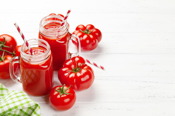 Fresh tomato juice and ripe tomatoes