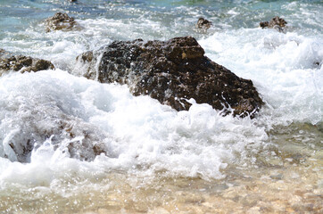 waves crashing on rocks