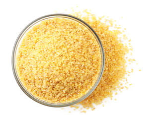 Dry bulgur in a glass plate on a white background isolated. The view from top