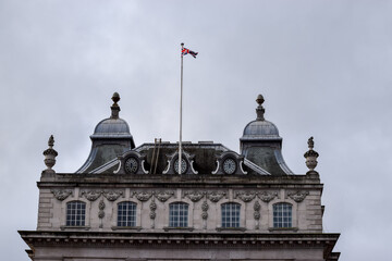 Fototapeta na wymiar UK flag on top of a building in London