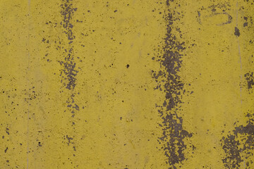 Texture concrete wall with peeling yellow paint