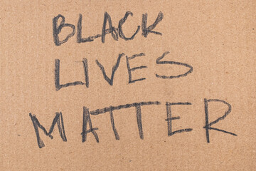 Black lives matter words written on cardboard