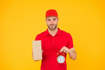 Will deliver at agreed time. Timeliness guarantee. Promptness and punctuality. Delivery time. Delivery courier with clock. Delivery man holding clock. Shipping services. Post office. Online shopping