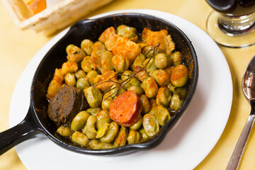 Catalan beans with blood sausage, chorizo, bacon