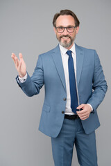 welcome on board. best business trainer. skilled bank worker. professional in business. bearded man after hairdresser. portrait of mature man wearing glasses. adult financial director in suit