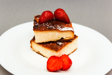 Homemade cottage cheese pudding or casserole with strawberries