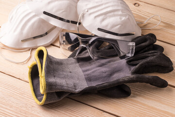 Dust masks, goggles and protective gloves. Personal protective equipment for workers