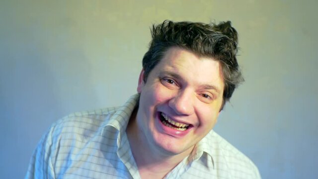 surprised men with tousled hair and bulging eyes.
