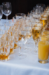 Festive glasses on the festive table during the Banquet. Alcoholic beverage